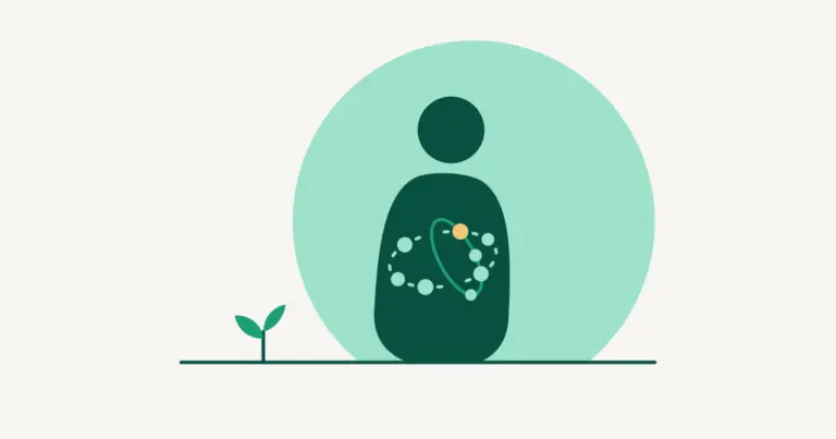 A calm, faceless figure stands before a large teal circle; inside its chest, small planets whirl on two crossing orbits